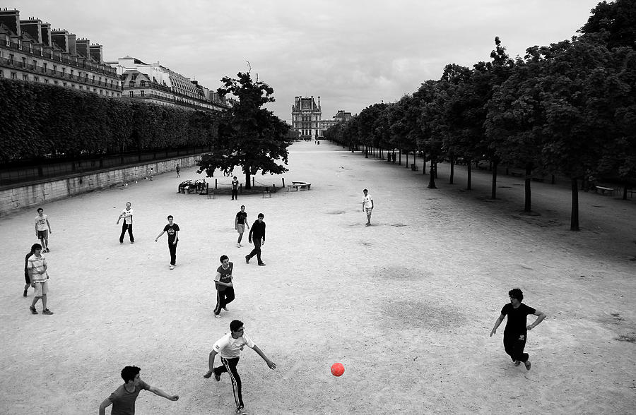 Soccer at the Louvre Photograph by Andrew Fare