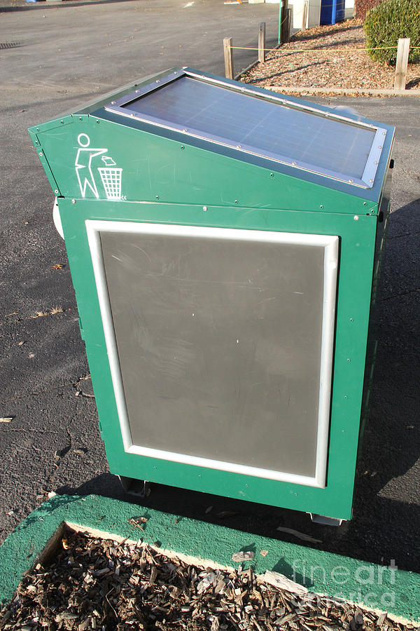 Solar Powered Trash Compactor Photograph by Photo Researchers, Inc.