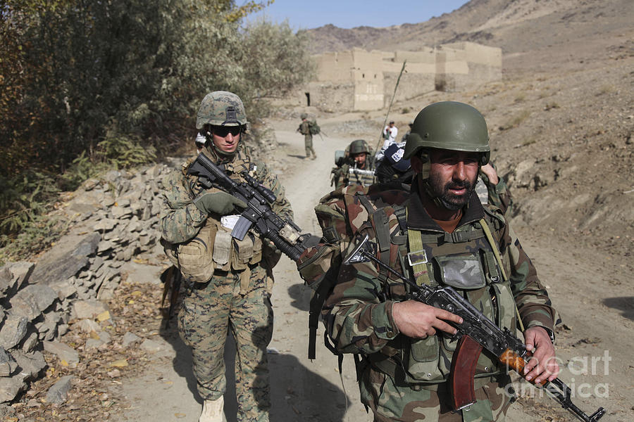 Soldiers Patrol The Depak Valley Photograph by Stocktrek Images