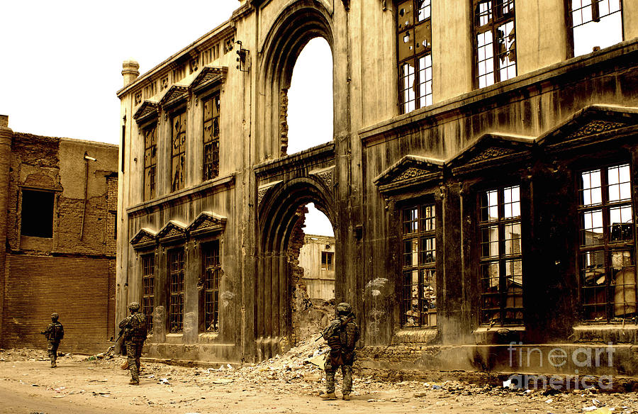Soldiers Patrolling Past The Facade Photograph by Stocktrek Images