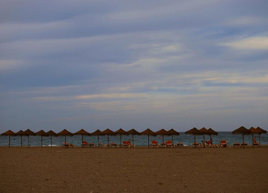 Beach Landscapes Photograph - Sombrillas al Atardecer by Eire Cela