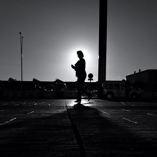 Shadows Photograph - Somewhere To Go by Andres De Leon