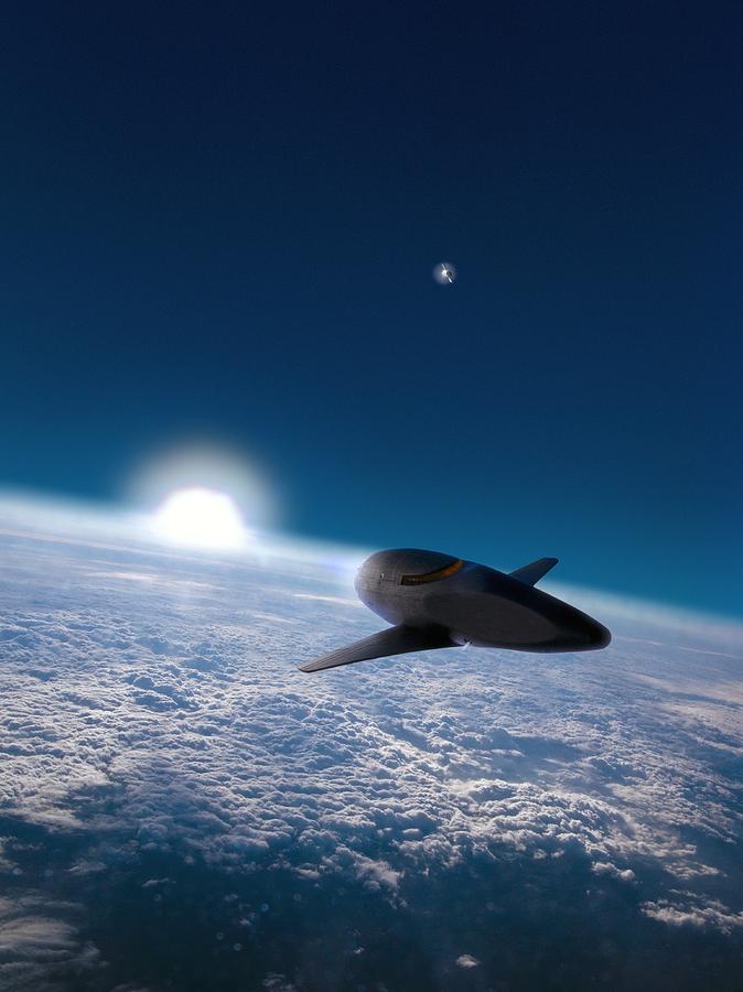 Space Plane In Earth Orbit Photograph by Richard Kail