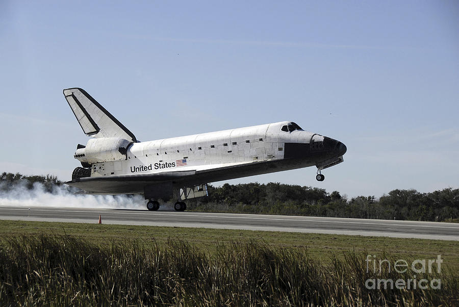 Space Shuttle Atlantis Touches Photograph by Stocktrek Images