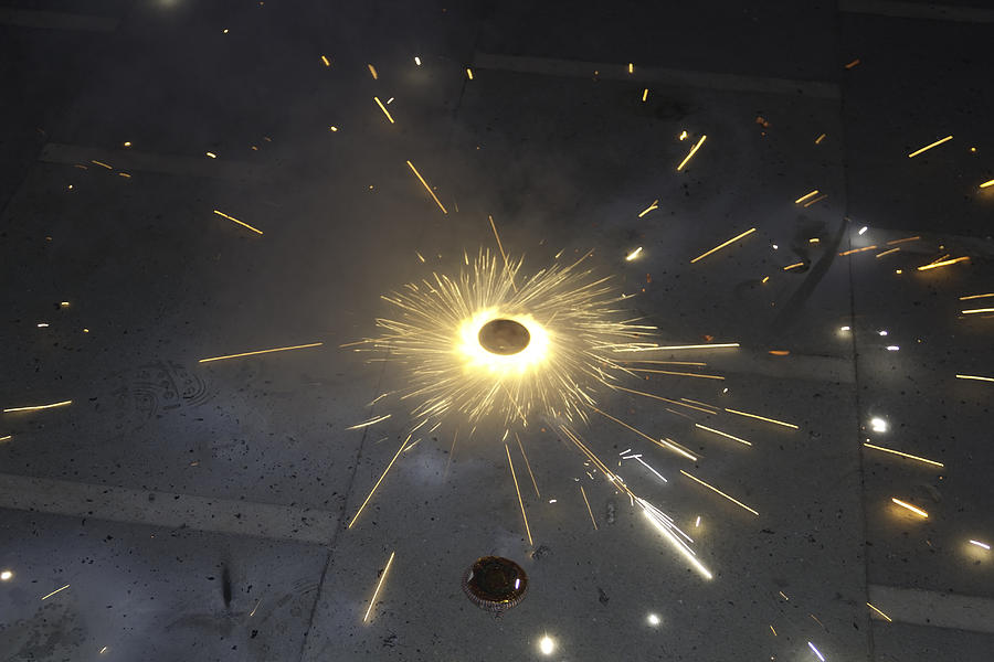 Sparks from a spinning firecracker during Diwali celebrations Photograph by Ashish Agarwal