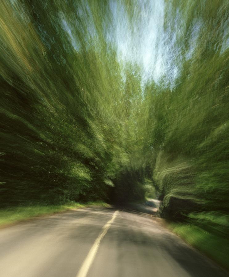 Speeding Down A Country Road Photograph by David Parker - Pixels