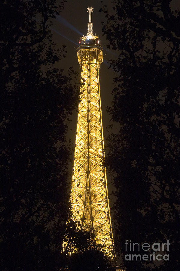 Spire of Eiffel tower by night Photograph by Fabrizio Ruggeri
