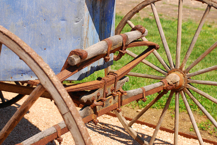 Spoked Wheels on Vintage Carriage Photograph by Connie Fox