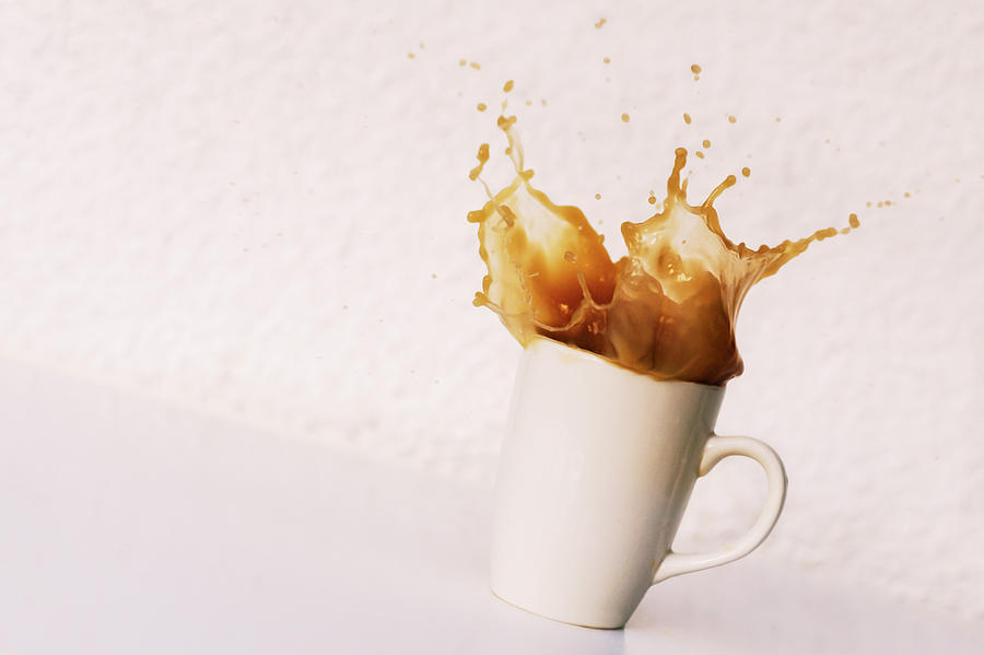 Spoon Being Dropped Into Mug Of Coffee Photograph by Matthew Fox ...