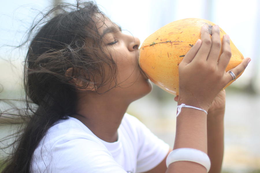 Sri Lanka Girl With Coconut Photograph By Kristina Burnham Fine Art