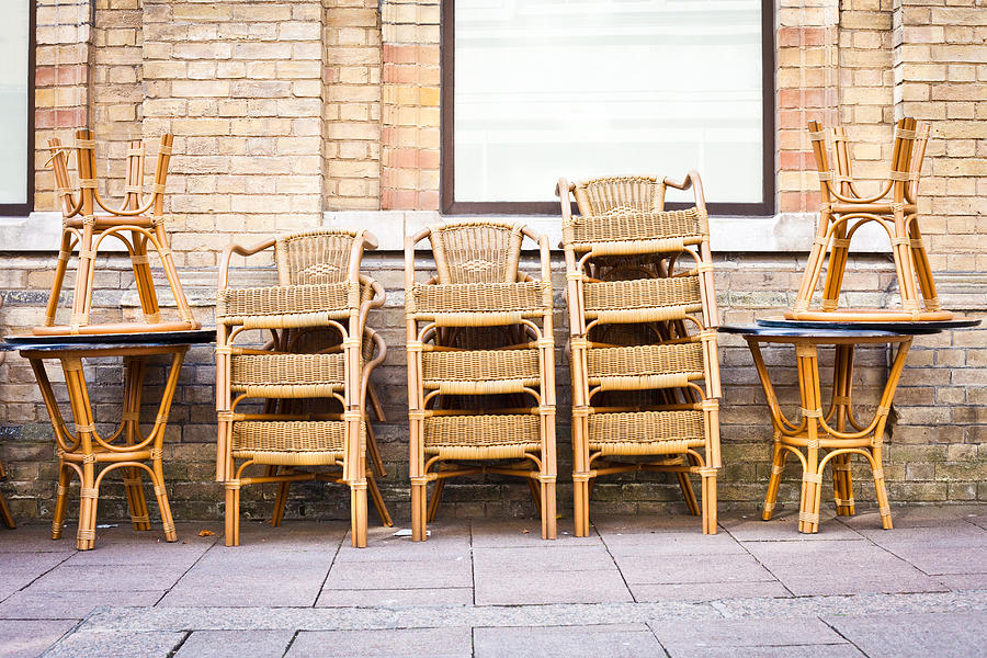 Winter Photograph - Stacked chairs by Tom Gowanlock