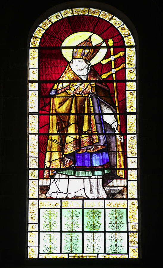 Stained glass window of a clergyman Photograph by Paul Cowan
