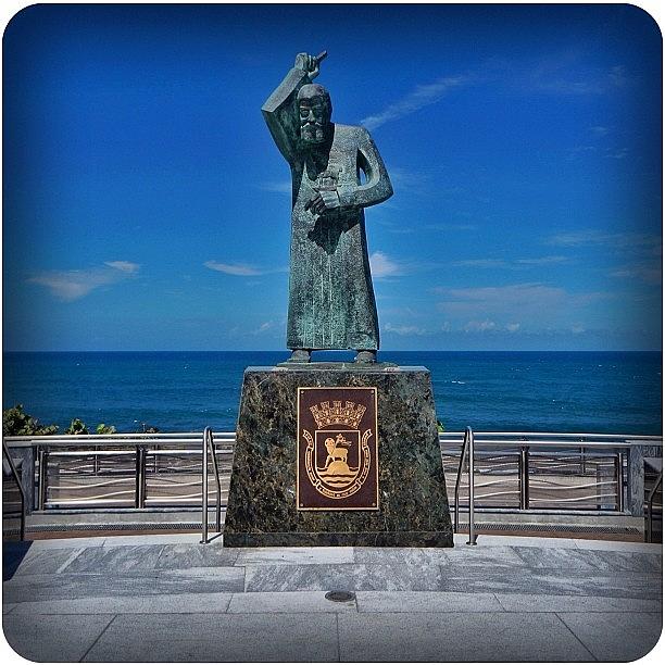 Summer Photograph - Statue Across From The Old San Juan by Rodino Ayala
