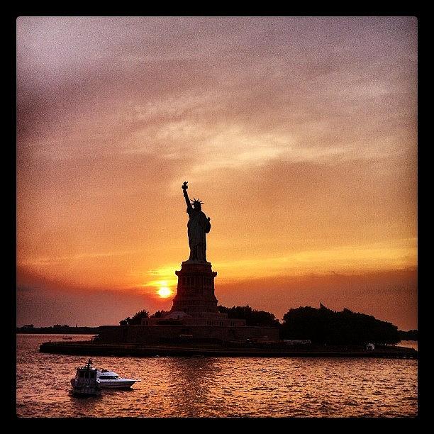 Sunset Photograph - Statue Of Liberty At Sunset From The by Arnab Mukherjee