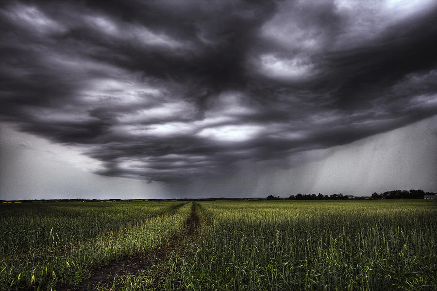 Storm Clouds And Rain Over A Track Photograph by Dan Jurak