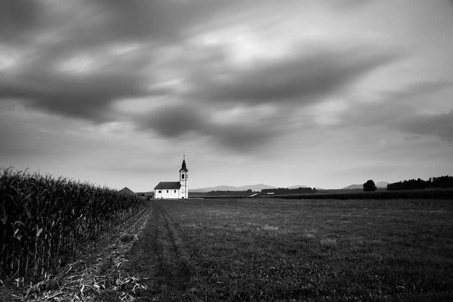 Landscape Photograph - Storm clouds gather over church by Ian Middleton