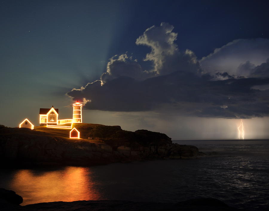 Storm Energizes The Lightning And The Lighthouse Photograph by Rick Frost