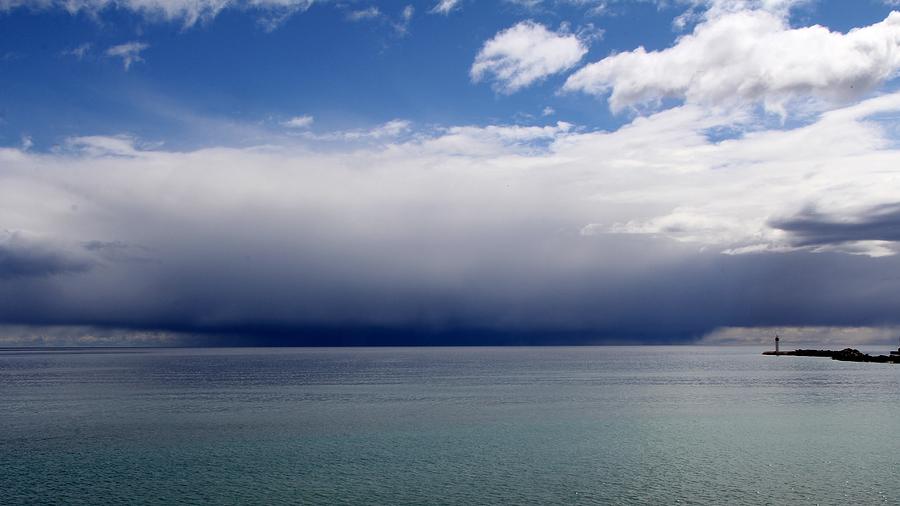Storm On The Horizon Photograph by Davandra Cribbie