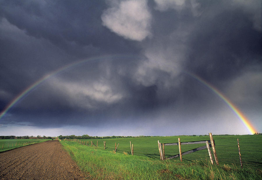 Landscape Photograph - Stormy Rainbow by Darwin Wiggett