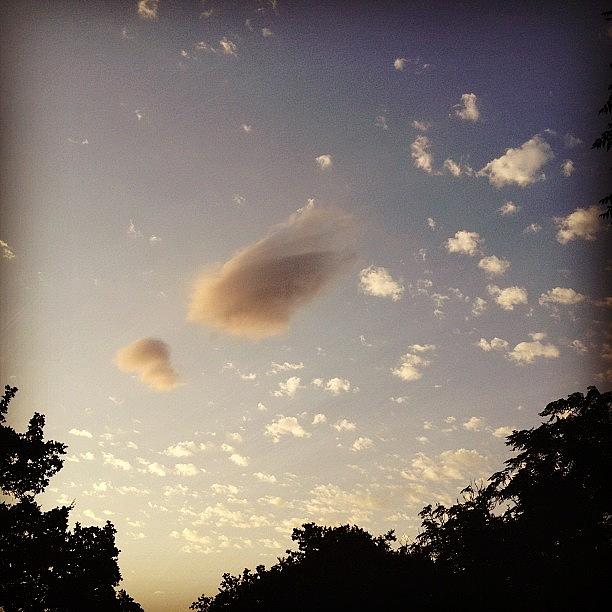 Strangest Clouds Hanging Low Photograph by Sweet John Muehlbauer