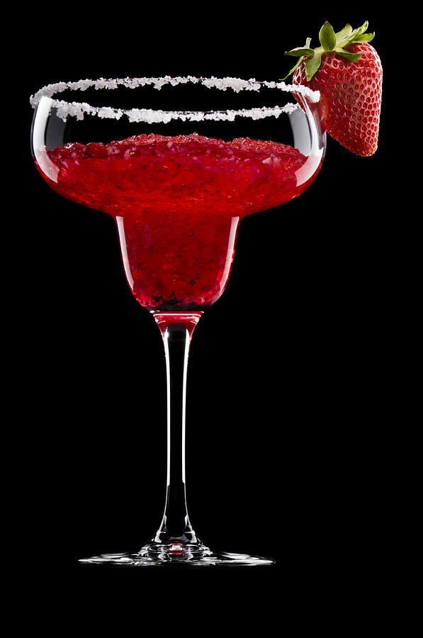 Strawberry Margarita in front of a black background Photograph by U Schade