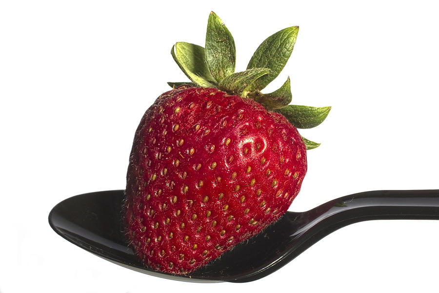Strawberry on a Black Spoon against White No.0003 Photograph by Randall Nyhof