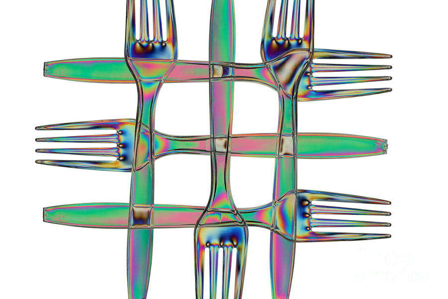 Stress In Plastic Forks Photograph by Ted Kinsman