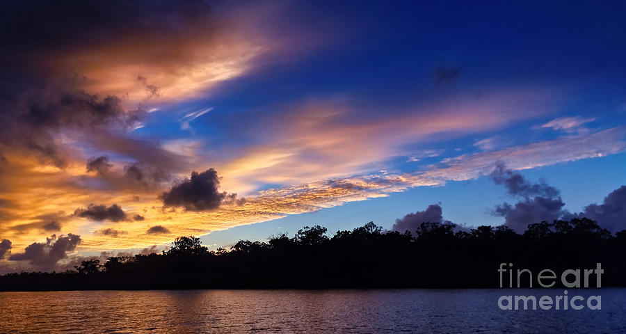 Sunset Photograph - Striking blue and gold sunrise by Geoff Childs