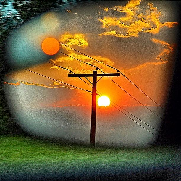 Stunning View Of The Sunset In The Car Photograph by Kay Anderson