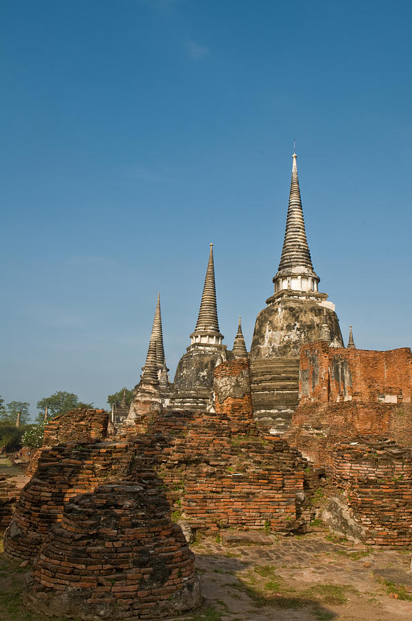 Stupas chedis of a Wat in Ayutthaya Photograph by U Schade