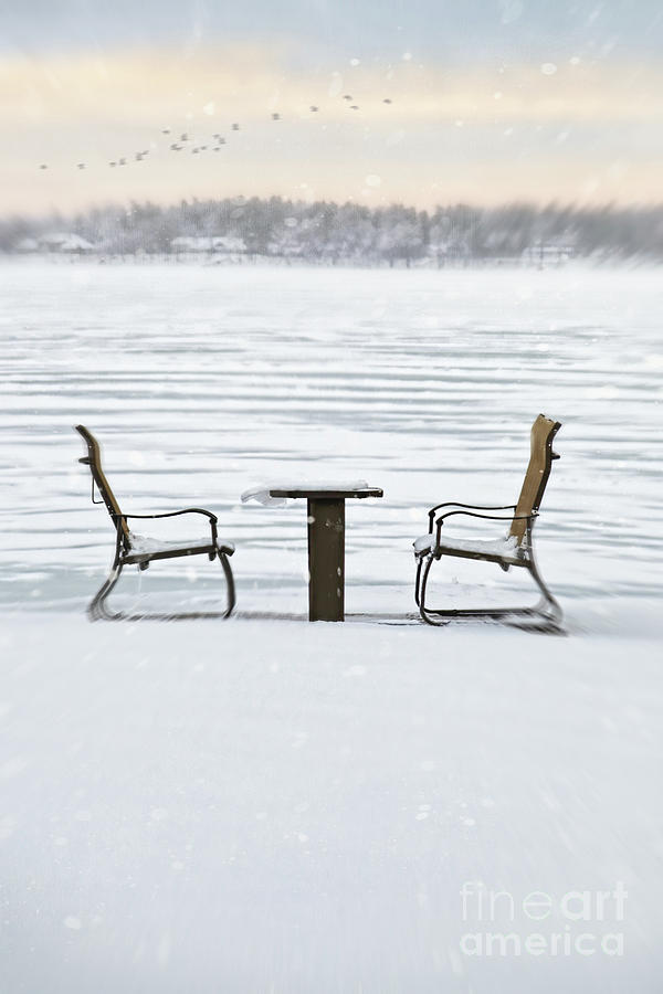 Summer chairs in winter near lake Photograph by Sandra Cunningham