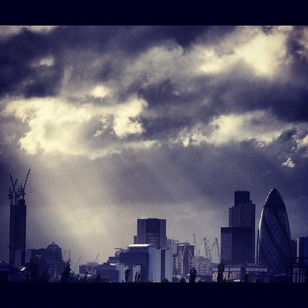 London Photograph - Sun Rays & Stormy Skies : London by Neil Andrews