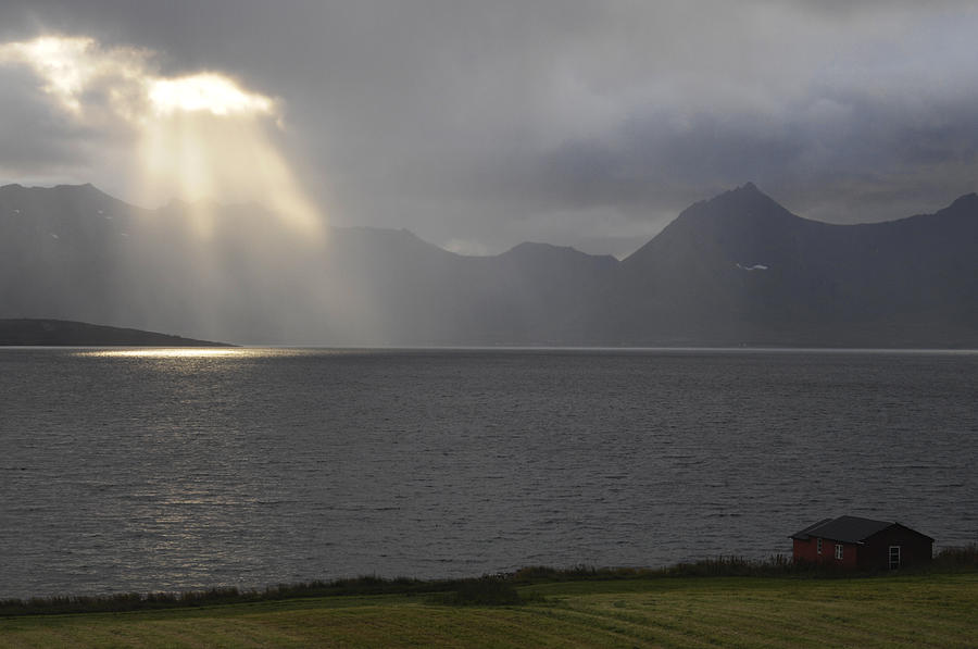 Sun rays over a fjord Photograph by Ulrich Kunst And Bettina Scheidulin