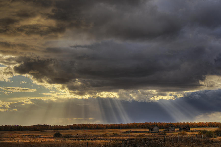 Sun Rays Through Clouds Over Three Old Photograph by Dan Jurak