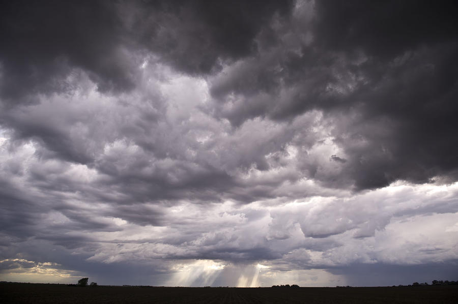 Farm Photograph - Sun Rays through Stormclouds by Jennifer Brindley