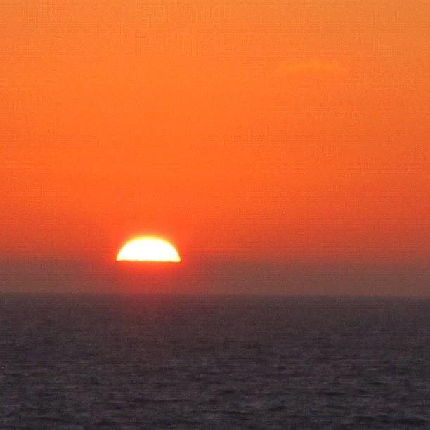 Sunset Photograph - Sun Setting At Sea by Susan Neufeld