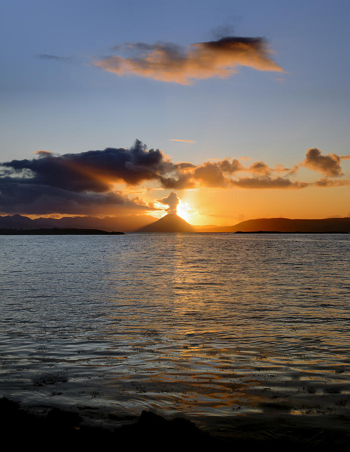 Sun setting on Skye Photograph by Gary Eason