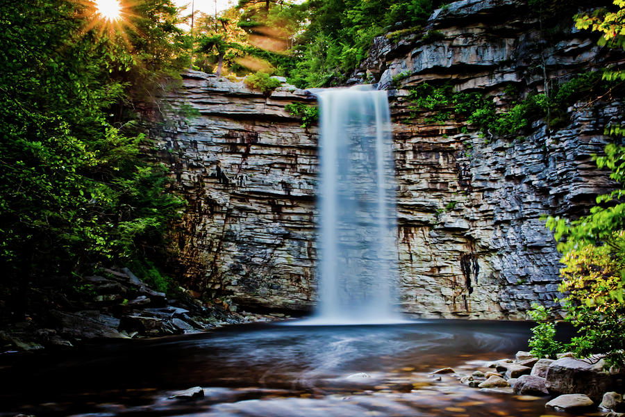 Sun setting over Awosting Falls Photograph by Dave Hahn