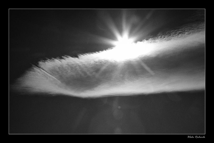 Sun Through Wing Cloud Photograph by Blake Richards