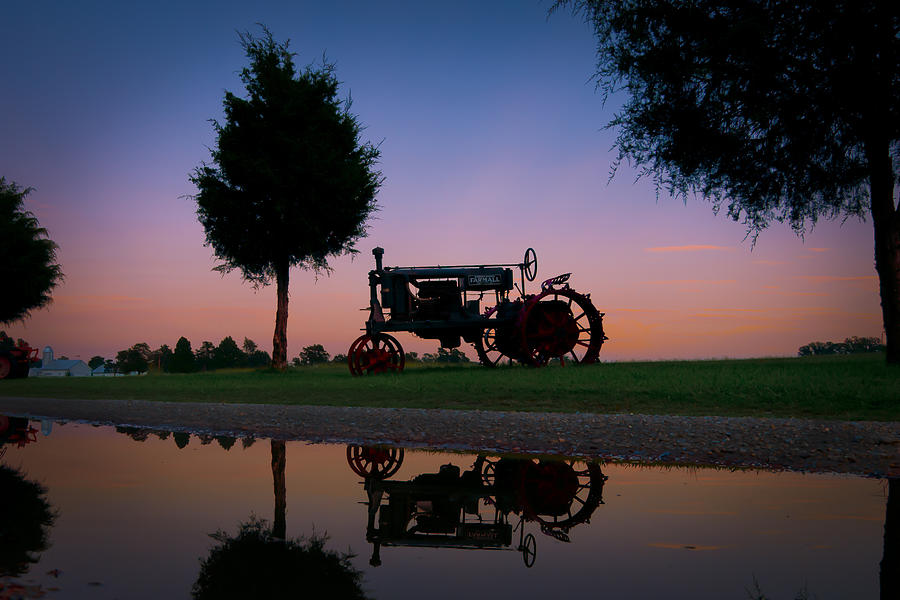 Sundown on Farmall at Chippokes Photograph by T Cairns