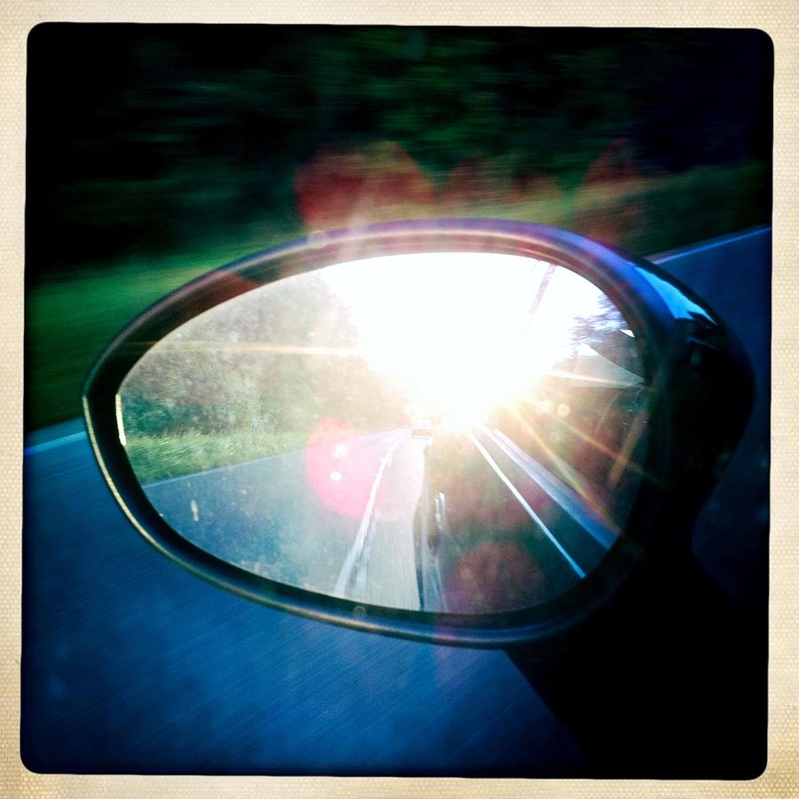 Sunlight in the rear mirror Photograph by Matthias Hauser