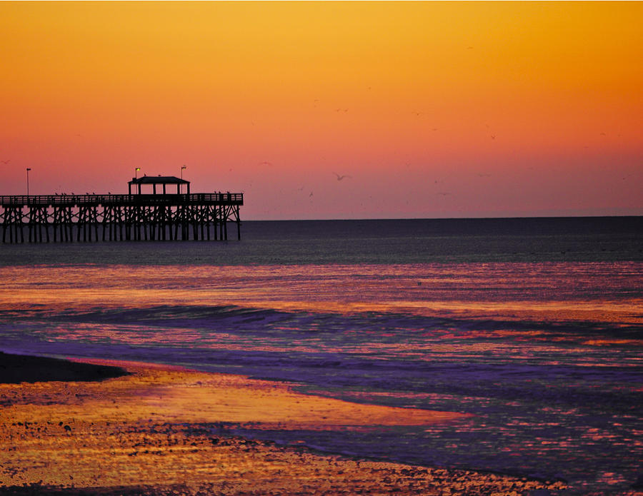 Sunrise at the pier Photograph by Joe Granita