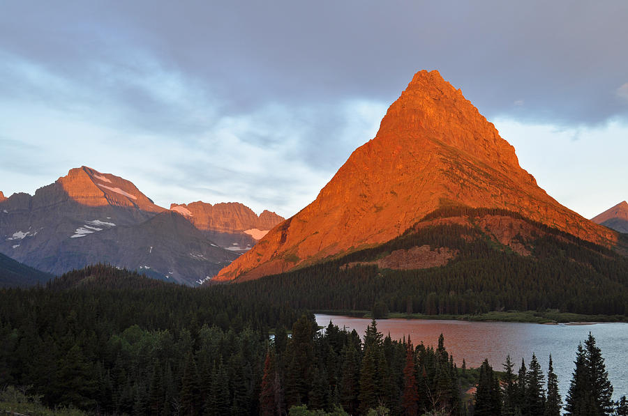 Sunrise over Glaciers Swiftcurrent Lake Photograph by Bruce Gourley