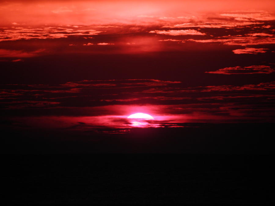 Sunrise over North Swan Beach NC  Photograph by Kim Galluzzo