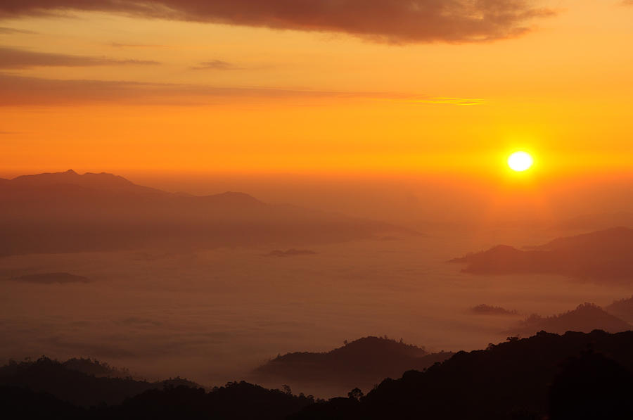 Nature Photograph - Sunrise Over The Mist Mountain by Preecha Sirima