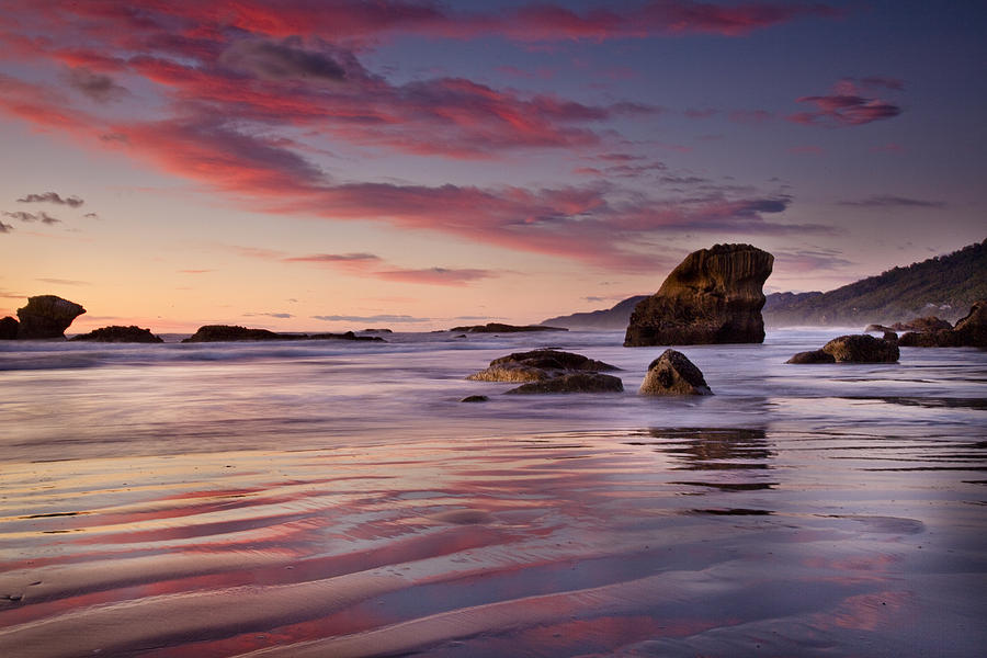 Sunset On Beach North Of Punakaiki Photograph by Colin Monteath