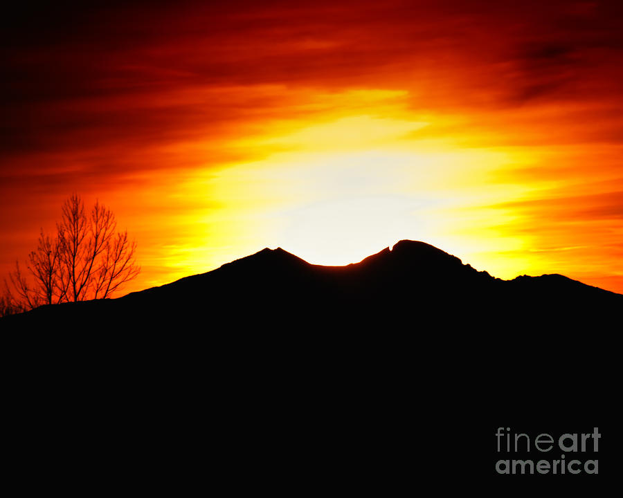 Sunset over Longs Peak Photograph by Harry Strharsky