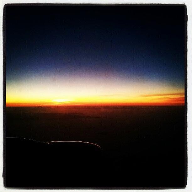 Sunset over Paris from a plane Photograph by Lynda Larbi