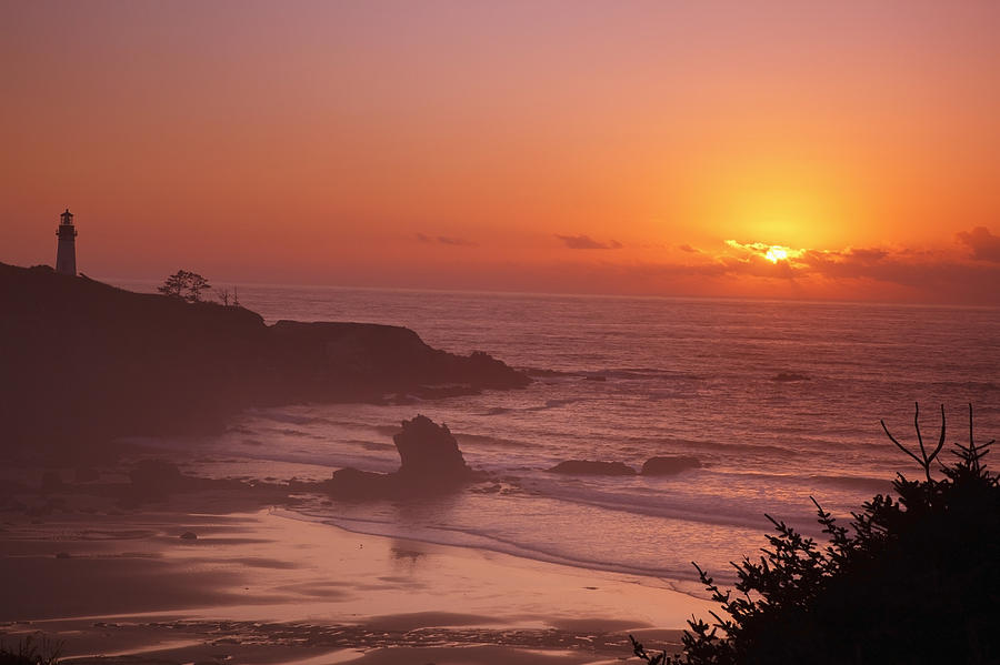 Sunset Photograph - Sunset Over Yaquina Head Lighthouse by Craig Tuttle