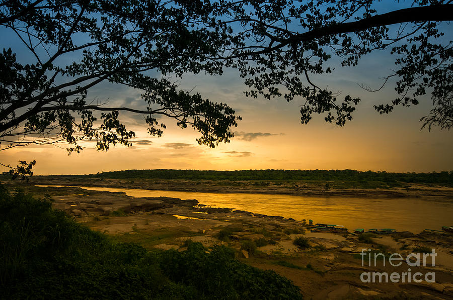 Nature Photograph - Sunset under the tree at river Kong by Natapong Paopijit